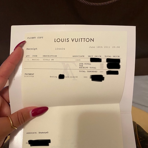 Louis Vuitton
Tivoli Handbag Monogram Canvas PM - Picture 13 of 16